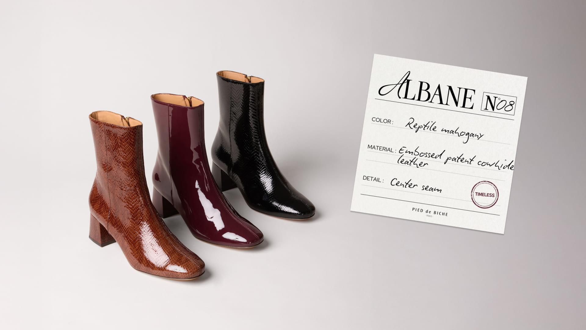 Women's reptile leather heeled ankle boots