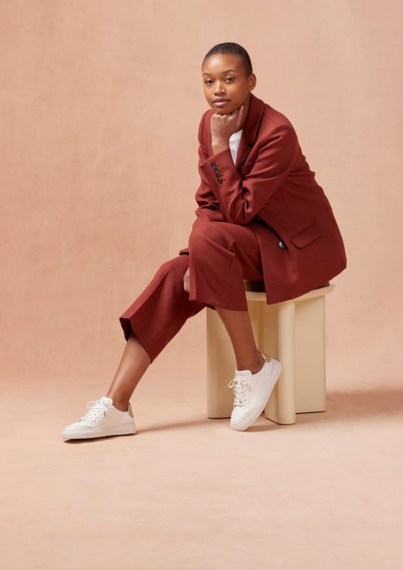 sneakers blanche en cuir avec cuir doré à l'arrière pour femme