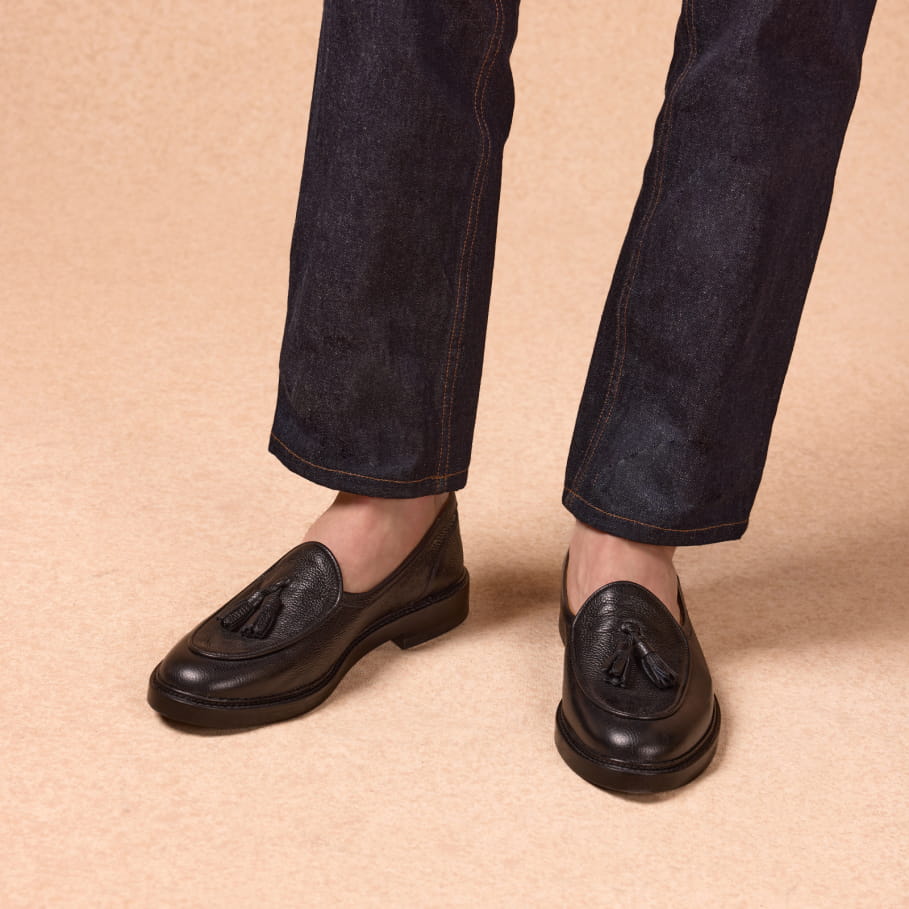 Loafer mit Quasten aus schwarzem genarbtem Leder für Herren